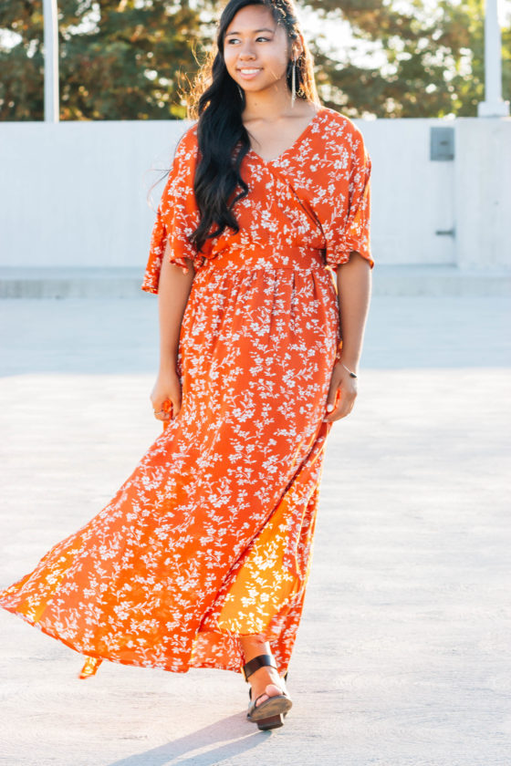 The perfect fall dress. Burnt orange, flower detail, tie back maxi dress with black heels. | In this post, Blaze Ann gives an honest life update, sharing where she's going to college, the last time she cried, etc.. on P31beauty.